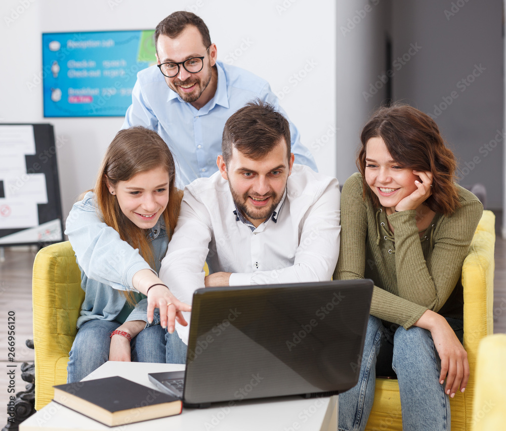 Fototapeta premium Young people with laptop