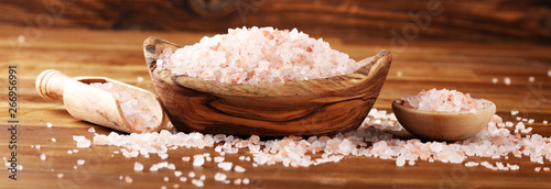 Natuaral cosmetics with pink himalayan spa salt. Sea bath salt for healthy spa relaxation photo