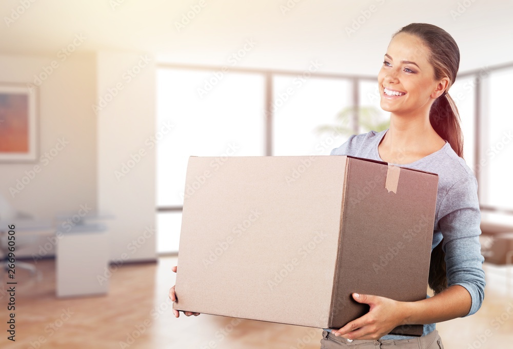 Attractive young woman with box, delivery concept Attractive young woman with box, delivery concept