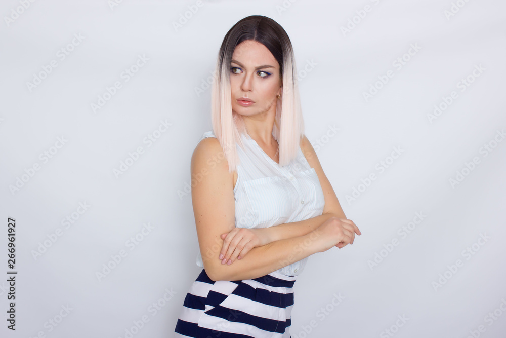 Lovely blonde woman wearing summer shorts and blouse Lovely blonde woman wearing summer shorts and blouse