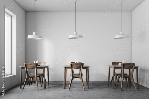 Interior of minimalistic white cafe