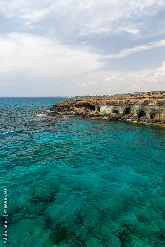 Picturesque sea caves are located on the Mediterranean coast.