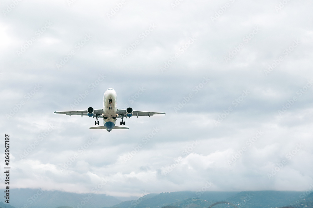 Airplane taking off from the airport against sky Airplane taking off from the airport against sky
