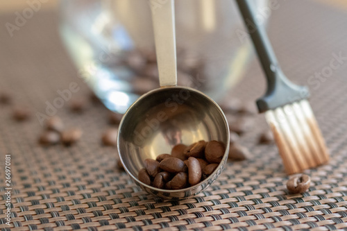 coffee beans in a scoop