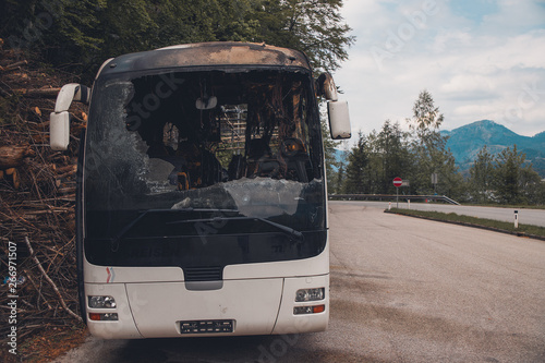 burned bus on the highway in Austria