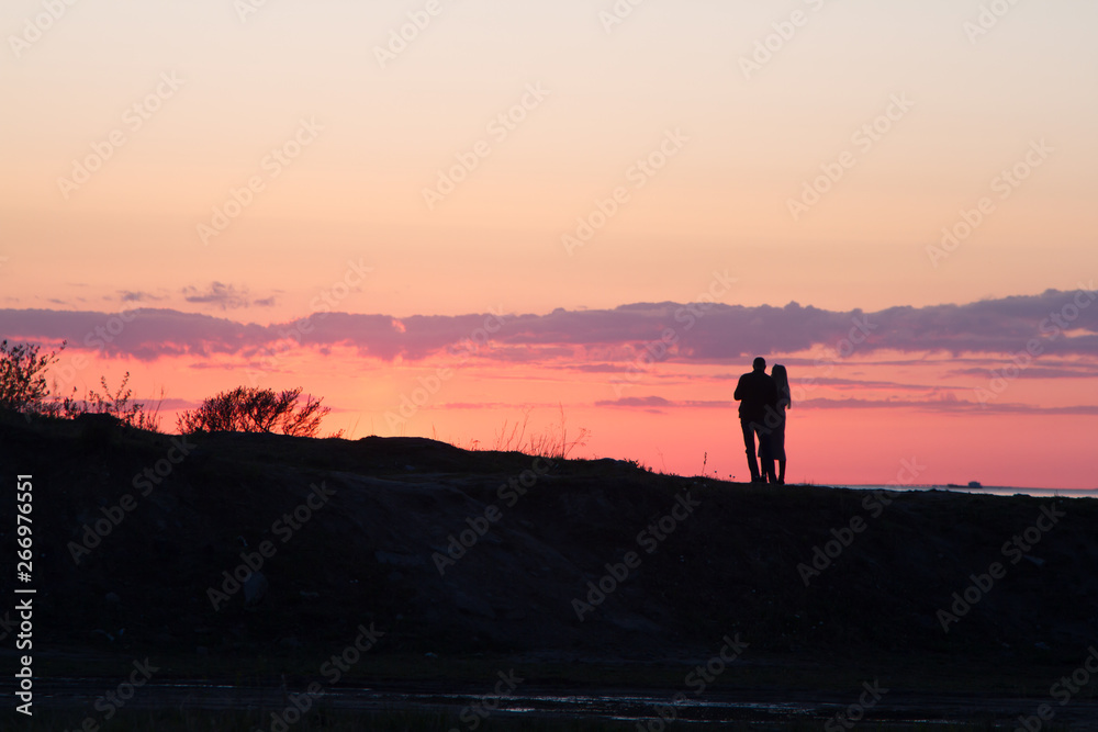 Fototapeta premium silhouette of man on top of mountain