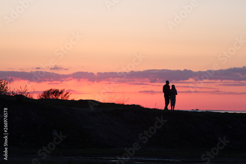 silhouette of photographer at sunset