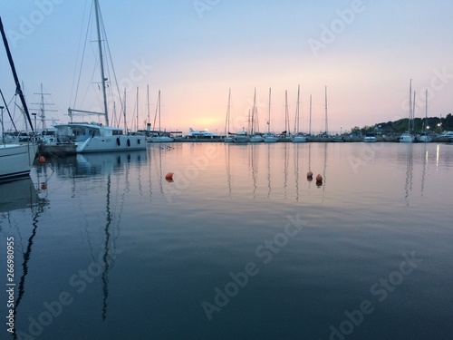Boats, marina at dawn, sunrise clouds,Thessaloniki Greece 