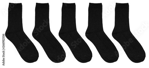 Set of black socks isolated on white background. Warm wool socks. Five pairs of black socks. In isolation