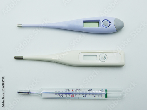 Digital and analogic medical Thermometers isolated on white background