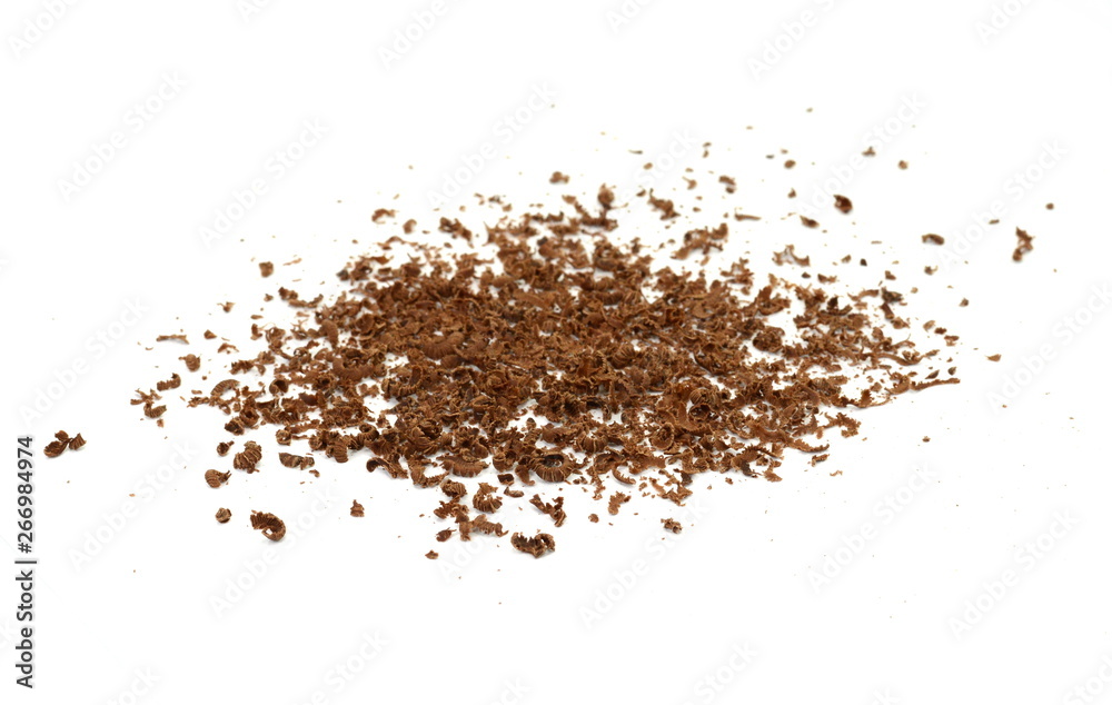 Fototapeta premium Grated chocolate. Heap of ground chocolate isolated on white background with clipping path, closeup.