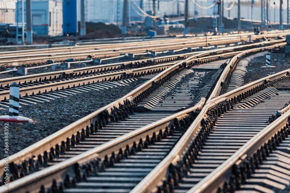 View of the rails, concrete sleepers and mound of crushed stone. The railroad tracks. View of the rails, concrete sleepers and mound of crushed stone. The railroad tracks.