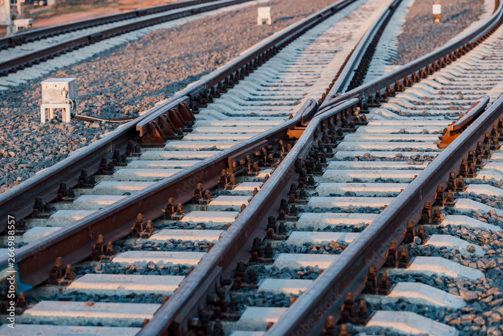 View of the rails, concrete sleepers and mound of crushed stone. The railroad tracks. View of the rails, concrete sleepers and mound of crushed stone. The railroad tracks.