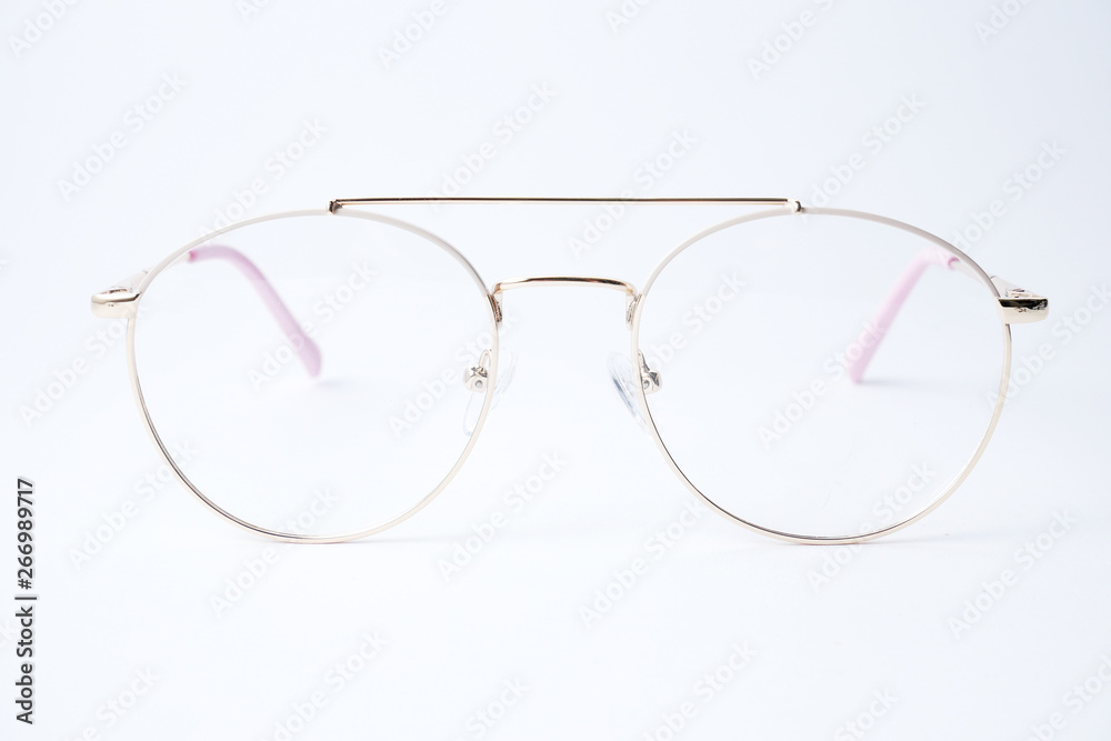 Round glasses for vision on a white background. Glasses with a gold metal frame. Round glasses for vision on a white background. Glasses with a gold metal frame.