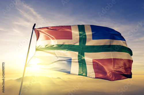 Εκτύπωση καμβά Groningen province of Netherlands flag waving on the top sunrise mist fog