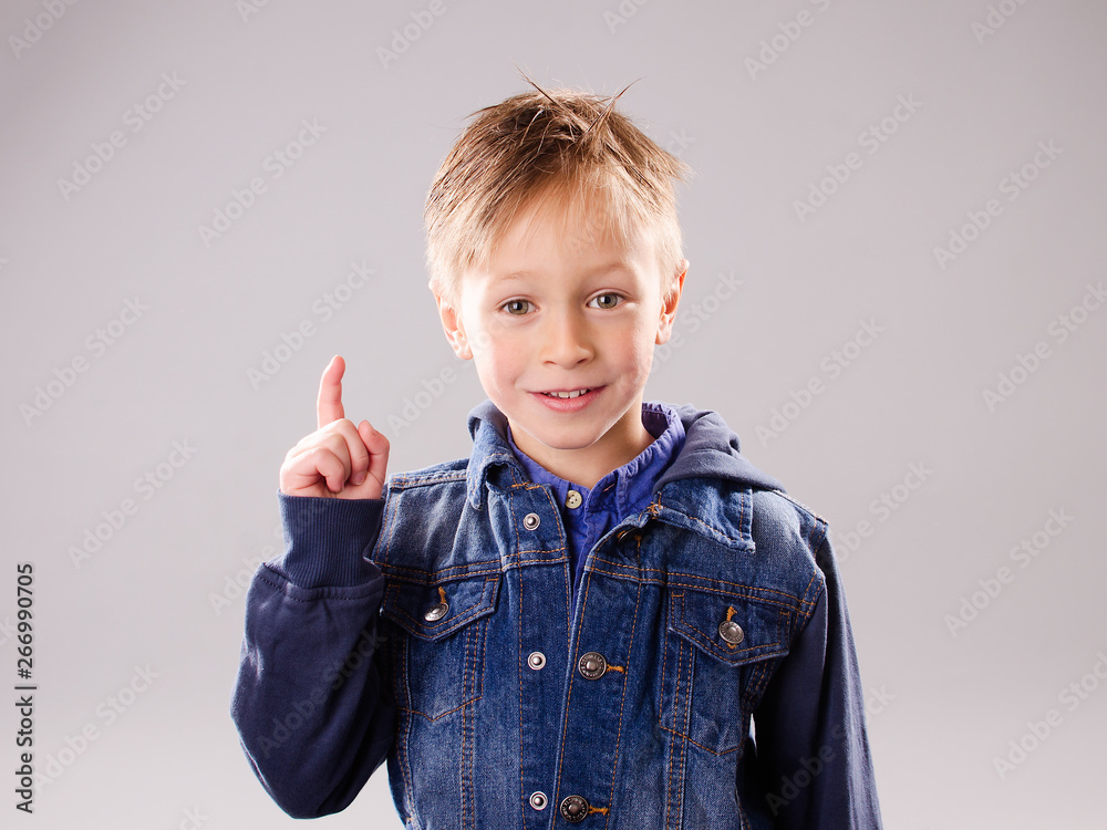 Little boy with raised finger Little boy with raised finger