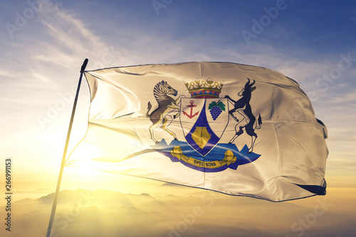 Western Cape province of South Africa flag waving on the top sunrise mist fog