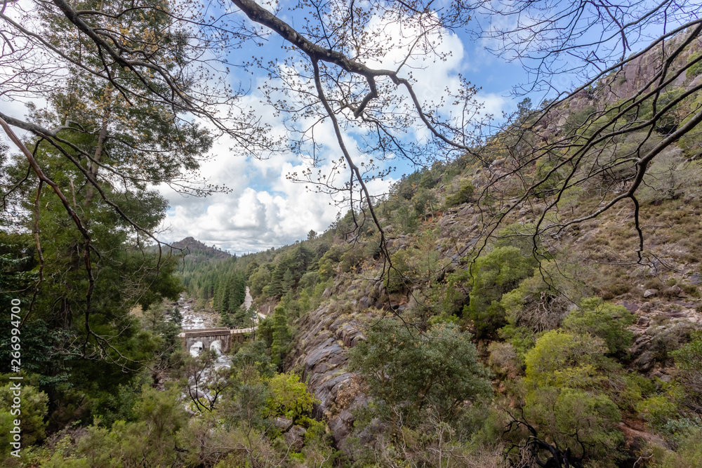 Small mountain bridge over a creek from the Peneda Geres National Park, north of Portugal. Small mountain bridge over a creek from the Peneda Geres National Park, north of Portugal.