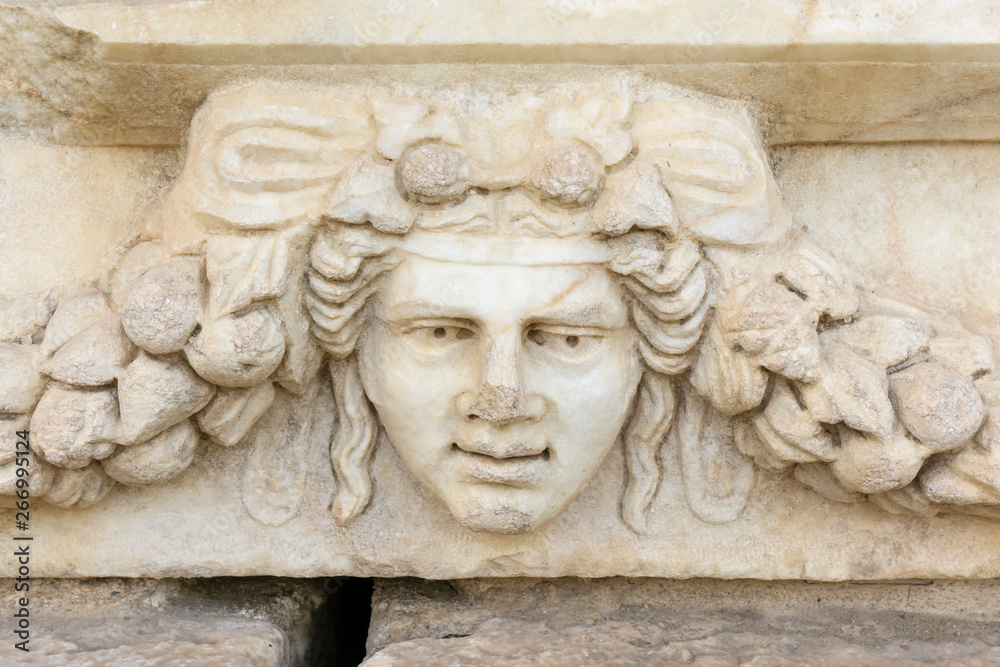 Decorative panel recovered from the ruins at the archaeological site of an ancient Greek city of Aphrodisias in Aydin Province of Turkey. Relief Sculpture Head