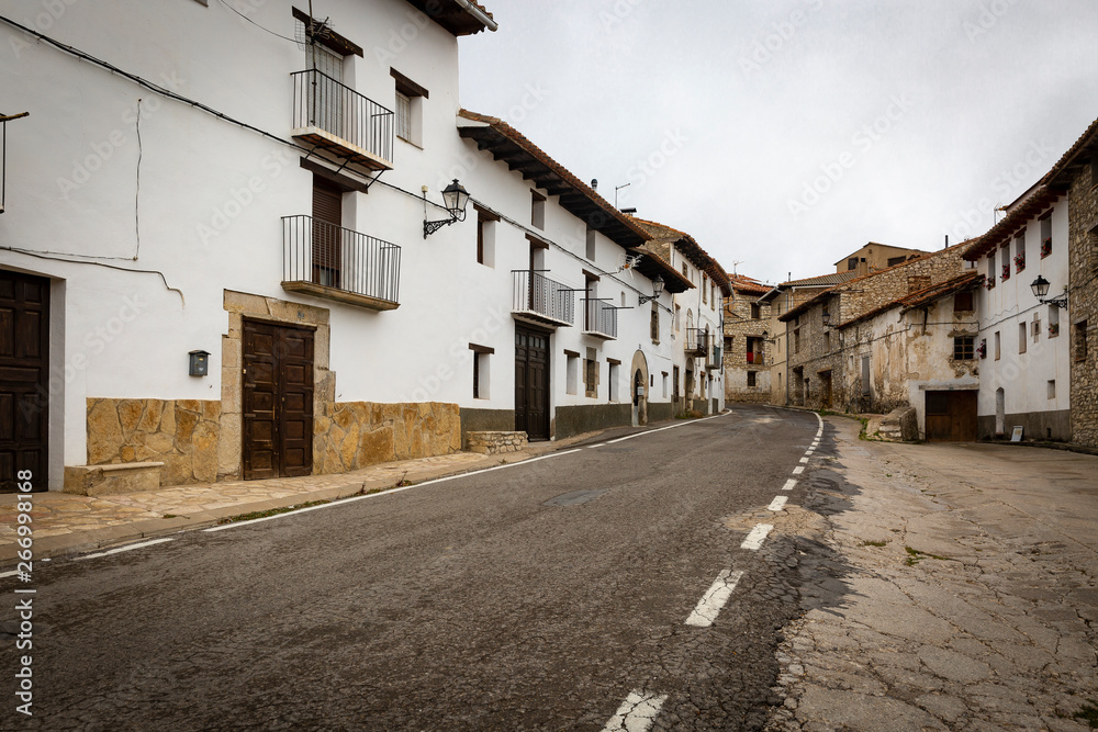 paved road passing through Fortanete town, province of Teruel, Aragon, Spain