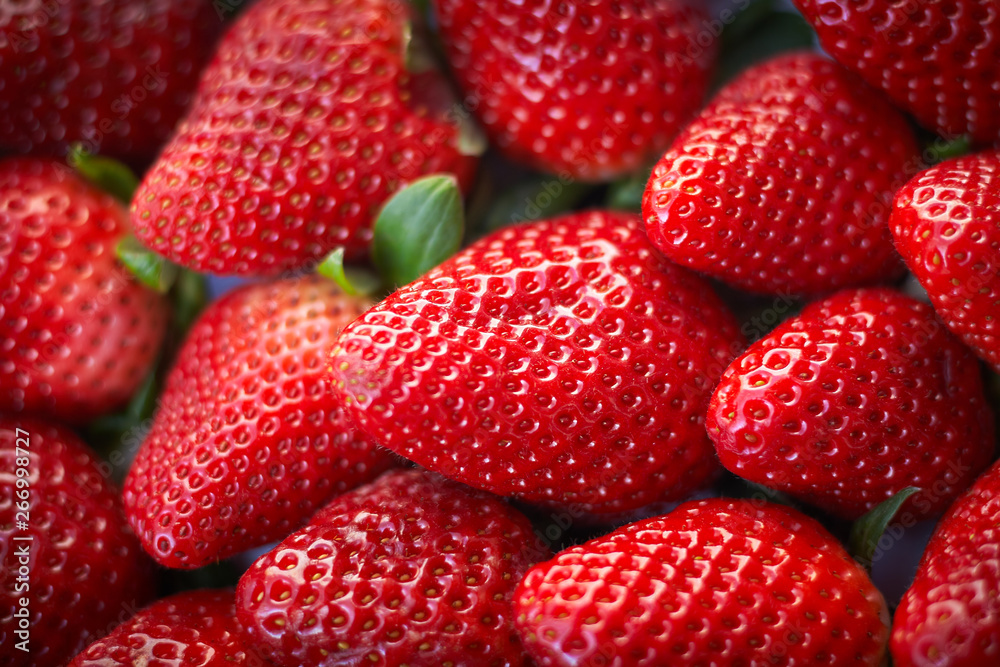Background of freshly harvested strawberries Background of freshly harvested strawberries