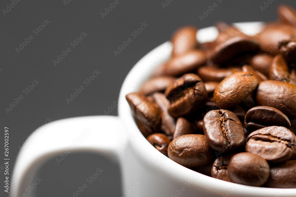 Freshly ground roasted coffee beans with fruits of coffee plant, full of grains. Freshly ground roasted coffee beans with fruits of coffee plant, full of grains.