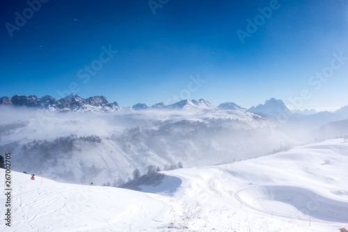 View of mountains through clouds in Alta Badia, Italy © Oldrich