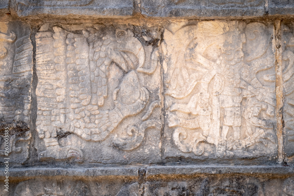 Ancient mayan stone relief representing a king and an eagle