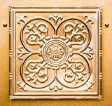 background wallpaper-vintage design embossed on an old copper door