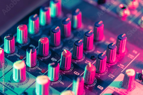 Close up of a pro mixing desk in a home recording studio