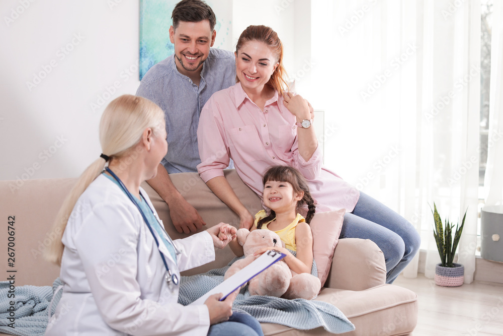 Family doctor visiting ill child at home Family doctor visiting ill child at home