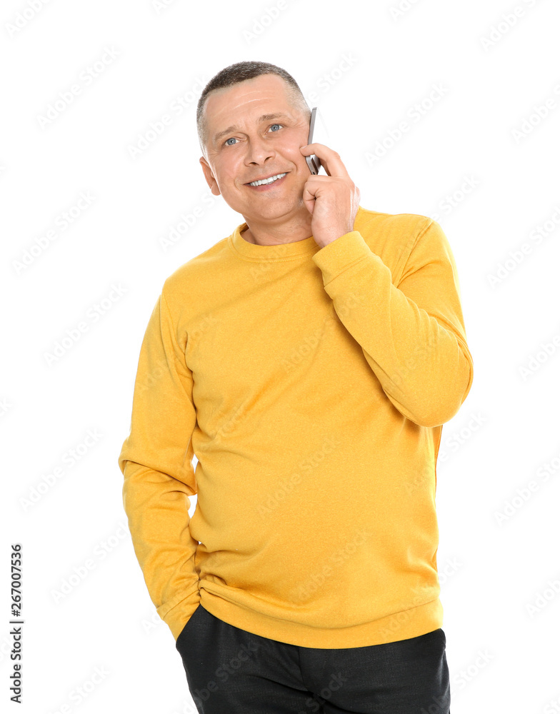 Portrait of mature man talking on phone against white background Portrait of mature man talking on phone against white background