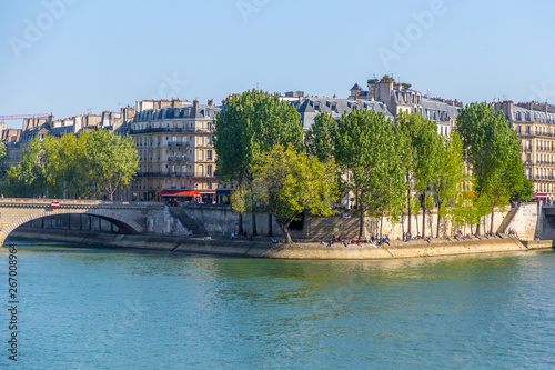 Parisian landscape with nice weater, blue sky and the seine river photo