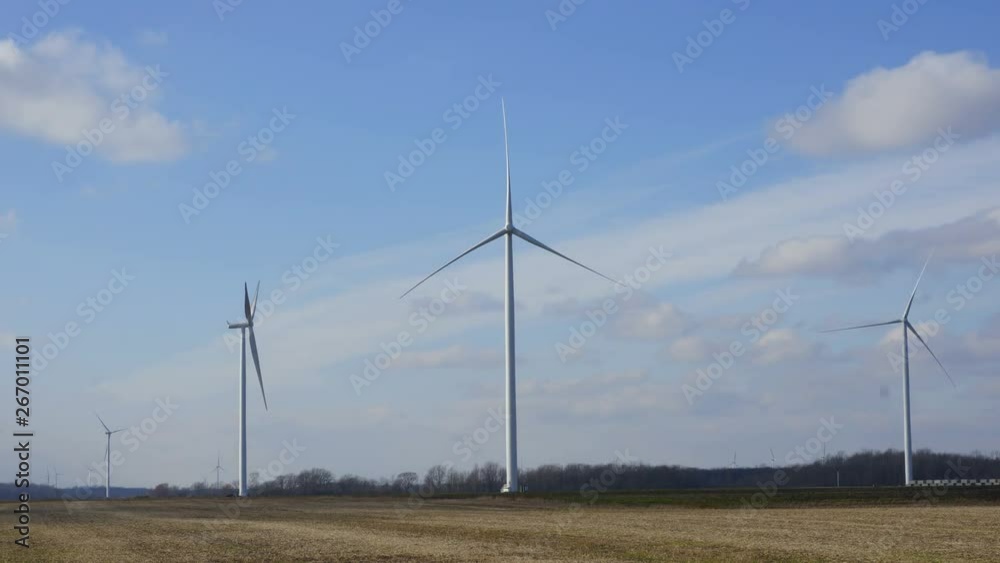 Unmoving still wind turbines on a windless day.Broken or unfinished wind turbines not moving timelapse. Unmoving still wind turbines on a windless day.Broken or unfinished wind turbines not moving timelapse.