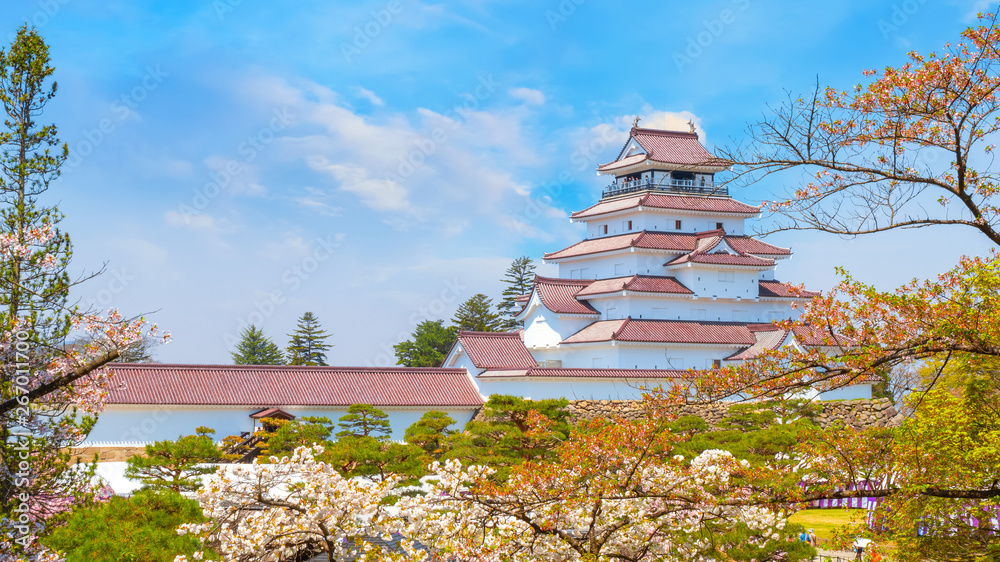 Aizu-Wakamatsu Castle with cherry blossom in Japan Aizu-Wakamatsu Castle with cherry blossom in Japan