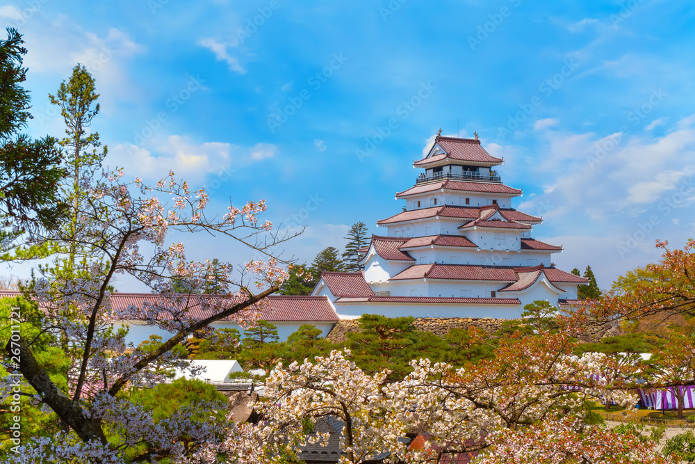 Aizu-Wakamatsu Castle with cherry blossom in Japan Aizu-Wakamatsu Castle with cherry blossom in Japan