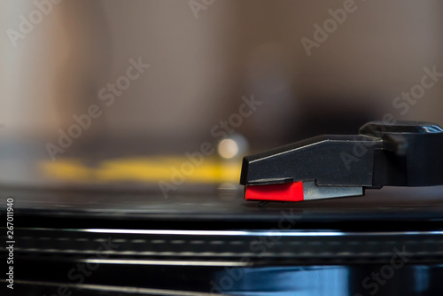 Turntable playing a vinyl - close up