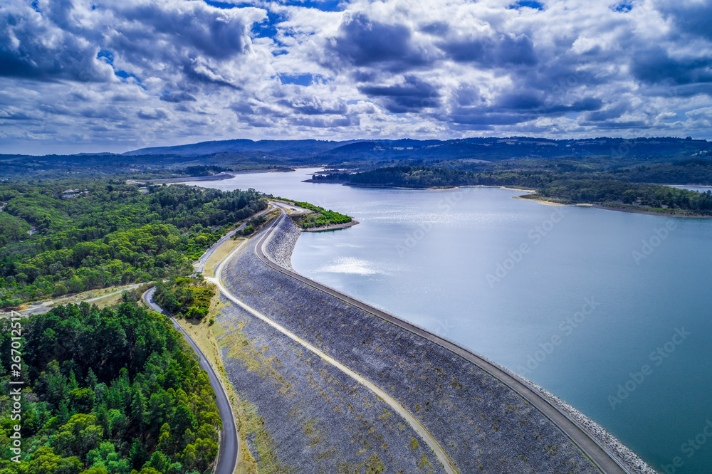Aerial view of beautiful Cardinia Reservoir Lake and dam wall on cloudy day