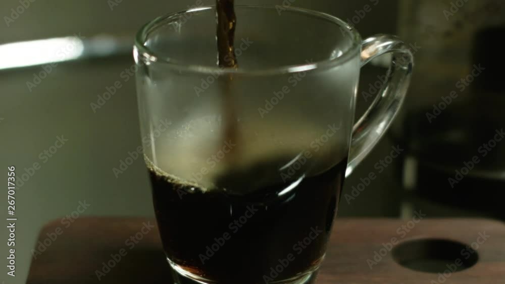 Coffee Being Poured In A Clear Mug Coffee Being Poured In A Clear Mug
