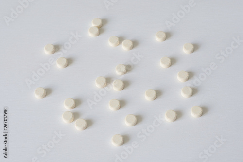 Pills on a white background. The concept of medicine, pharmacy and health care