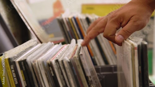 Hands Searching old vinyls in the record store 