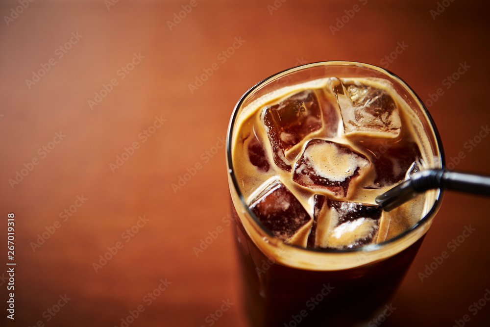 Iced cafe latte on table Iced cafe latte on table