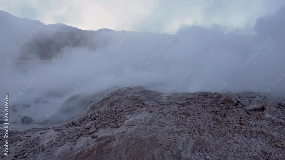 El Tatio geysers eruption before sunrise in the Atacama desert in Chile, South America El Tatio geysers eruption before sunrise in the Atacama desert in Chile, South America