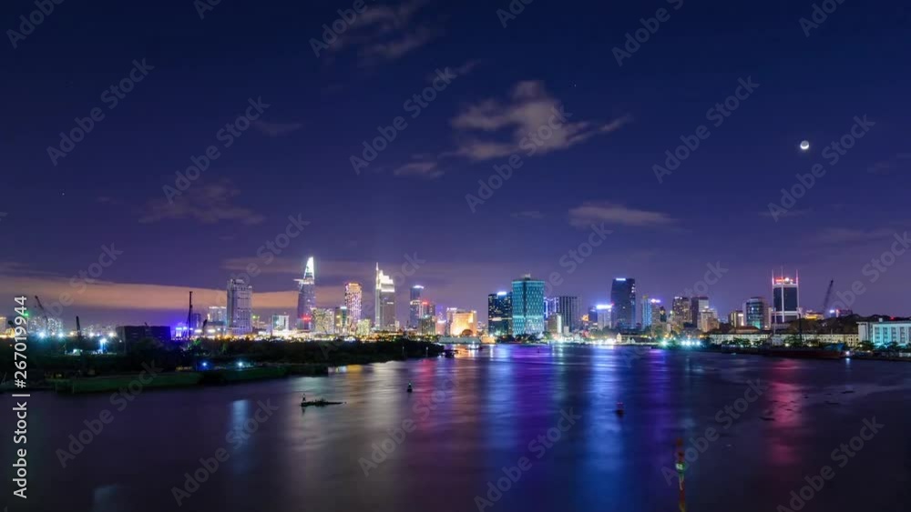 Cinemagraph of a timelapse of Saigon Skyline at night. Only the bottom part of the frame with sea and boats is moving Cinemagraph of a timelapse of Saigon Skyline at night. Only the bottom part of the frame with sea and boats is moving