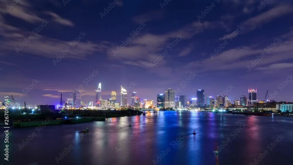 Cinemagraph of a timelapse of Saigon skyline in Vietnam at night. Only the sky and the buildings change Cinemagraph of a timelapse of Saigon skyline in Vietnam at night. Only the sky and the buildings change