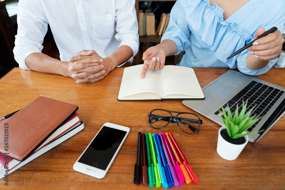 education and school concept, students campus or classmates learning tutoring catching up friend for a test or an exam in classroom education and school concept, students campus or classmates learning tutoring catching up friend for a test or an exam in classroom