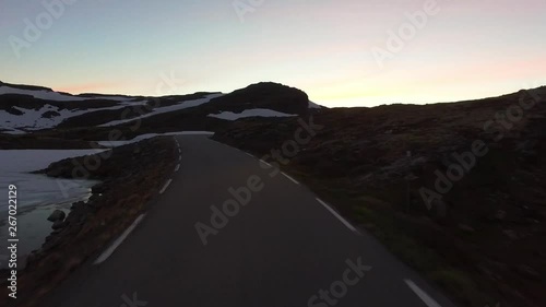 Aurlandsfjellet is a scenic norwegian moutain route and a part of the national tourist route in norway, midnight drive on midsummer in norway Fast motion photo