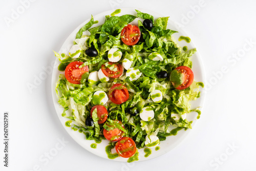 greek salad with mozzarella and pesto