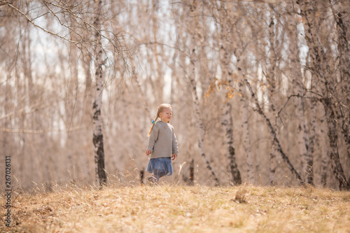 baby's walk in the birch grove of Russia © AnastasiaKharichkina