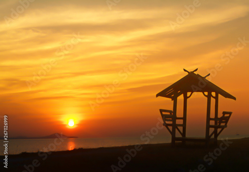 beuatiful sunset at the sea with a little hut on the beach ,Thailand abstract summer nature wallpaper background